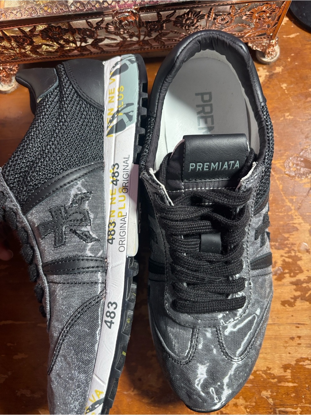Premiata Black Low-Top Lace-Up Sneakers with Subtle Star Detail